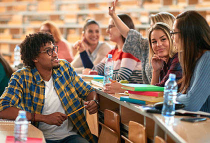 Diverse group of students studying in university 